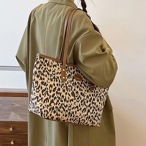 Chic leopard print tote bag with brown leather straps for autumn winter commute style