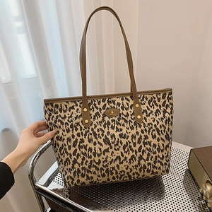 Large leopard print tote bag with brown leather handles for autumn fashion casual wear