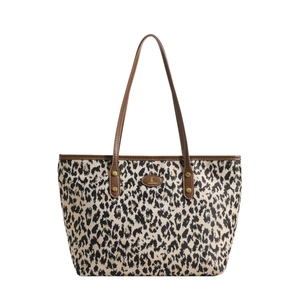 Classic leopard print tote bag with brown leather handles and gold rivet accents
