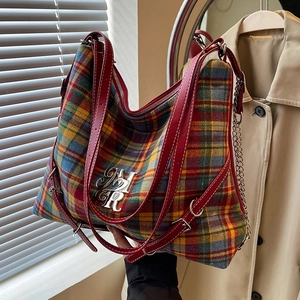 British style tartan tote bag with NYR metal logo and deep red leather straps