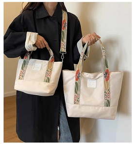Size comparison of white canvas tote bags with floral handles and detachable straps