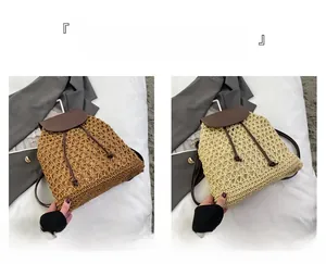 Detail of woven straw backpacks in khaki and beige with contrast leather drawstring and flap