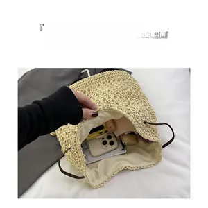 Interior view of large capacity straw backpack with light fabric lining for beach travel