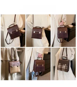 British vintage mini backpack detail showing dual straps and premium checkered texture