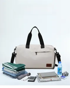 Internal storage detail of large oxford travel bag with clothes and accessories