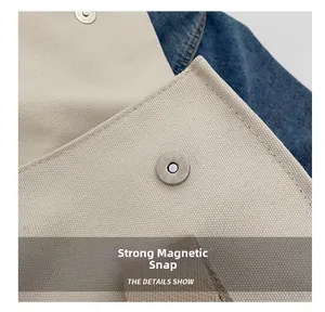 Detailed close-up of the canvas tote bag featuring a strong circular magnetic buckle
