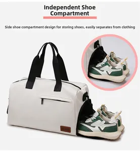 Detail of the large oxford travel bag featuring a dedicated side shoe compartment