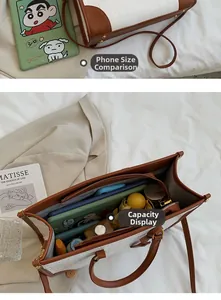 Detail showing spacious interior of the tote bag with phone comparison and daily essentials