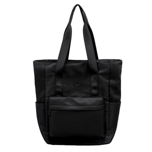 Large black nylon tote bag with front zip pocket and side pockets for school or commute