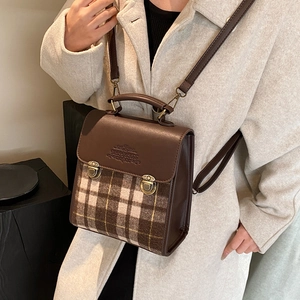 Retro patchwork crossbody bag in brown faux leather and wool with metal buckles