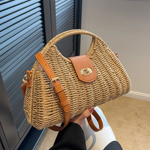 Straw woven handbag with brown leather flap and golden twist lock for women