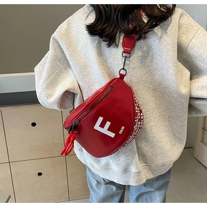 Detail of red crossbody bag with white F letter print and wide branded shoulder strap