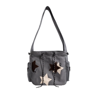 Vintage dark gray canvas tote bag with star patches and drawstring closure