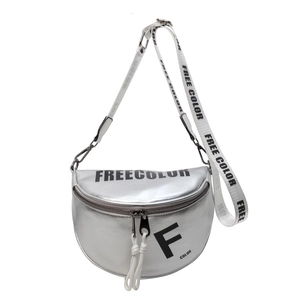 Silver metallic crossbody saddle bag with wide logo strap and front brand print