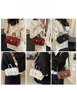 Close-up of stylish crossbody bags in four colors with wide woven shoulder straps