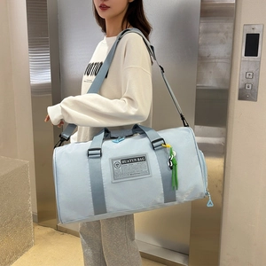 Light blue Oxford cloth travel bag with large capacity and adjustable shoulder strap