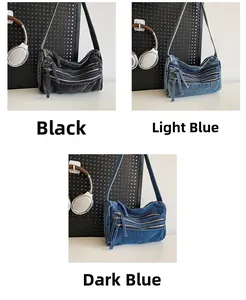 Detailed view of denim tote bags in black, light blue, and navy with triple zip pockets