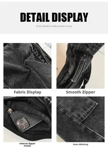 Détails d'un cabas en jean noir délavé avec fermetures éclair en métal et coutures blanches