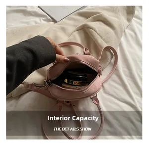 Internal view of pink quilted bucket bag showing space for cosmetics and essentials
