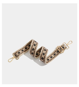 Detail of bohemian geometric embroidered bag strap with premium gold metal swivel hooks