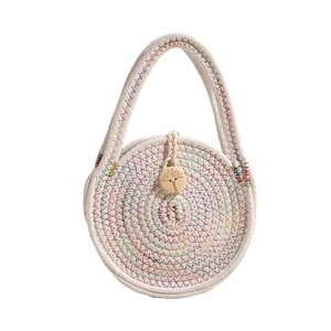 Handmade mini round woven straw crossbody bag with rainbow stitching and wood button