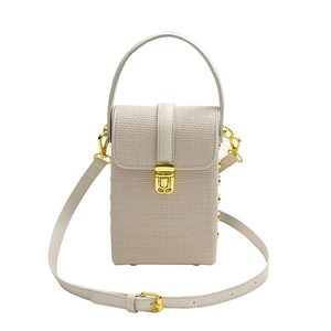Cream woven mini crossbody bag for women with gold clasp and textured synthetic leather