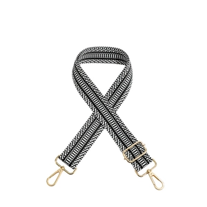 Adjustable black and white geometric pattern shoulder strap with gold metal buckles