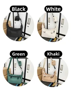 Nylon messenger bag in four colors with functional zippers and mini pouch charm