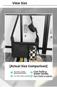 Detail showing versatile black nylon bag size comparison with phone and storage capacity