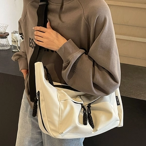 White large capacity crossbody tote bag with black wide strap and multi-pocket design