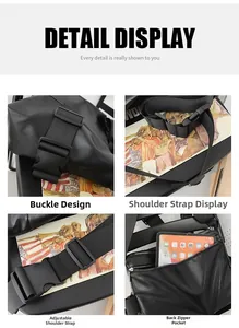 Detail of black tote bag showing buckle closure, adjustable strap and back zipper pocket