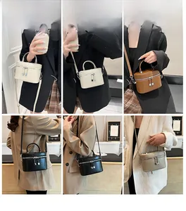 Détails du mini sac seau montrant les différents modes de porté main et en bandoulière