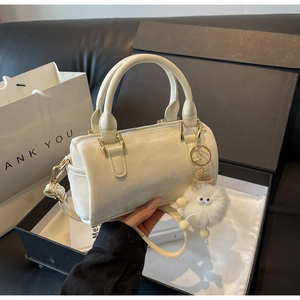 Beige Boston barrel bag in a gift box with silk lining and cute plush pendant charm