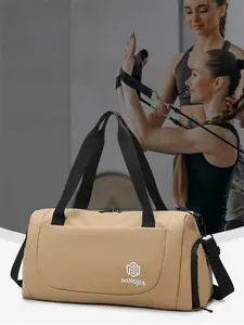 Water-repellent duffel bag featuring a separate shoe compartment for gym and travel
