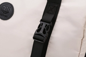 Detailed close-up of water-resistant oxford fabric with reinforced stitching and buckle