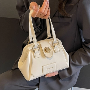 Cream white Boston handbag with gold metal hardware and double handles for women
