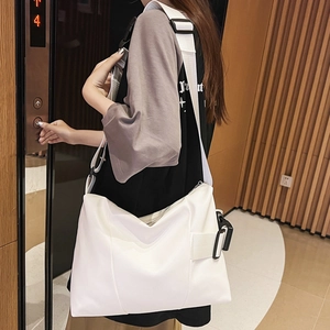 White large capacity crossbody tote bag with adjustable wide strap for daily casual use