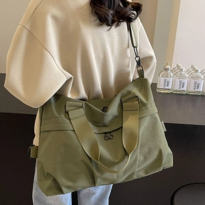 Olive green nylon tote bag with large capacity for travel and daily commuting