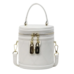 White quilted vanity case bucket bag with gold lock hardware and top handle for women