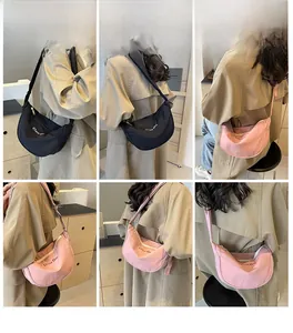 Collage of black and pink nylon crescent crossbody bags showing fit and strap details