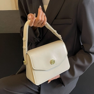 Elegant cream white structured rectangular handbag with gold rotating metal buckle