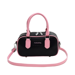 Pink and black contrast leather Boston bag with silver hardware and top handles