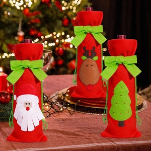 Three-piece red felt Christmas wine bottle covers with ribbon and festive holiday motifs