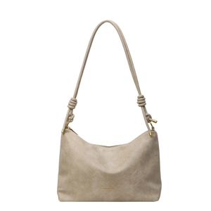 Chic apricot PU leather tote bag with knotted strap details and top zipper closure