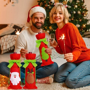 Three-piece Christmas wine bottle covers set with Santa and reindeer motifs in a home setting