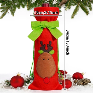 Red felt Christmas wine bottle cover with reindeer embroidery and a green bow detail