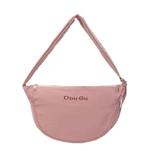 Pale pink nylon crescent shoulder bag featuring a wide strap and minimalist logo detail