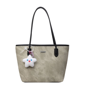 Grand sac cabas en toile grise avec poignées en cuir noir et breloque en étoile