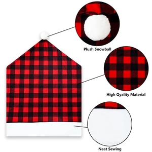 Detailed view of buffalo plaid chair cover featuring plush snowball and neat sewing craft