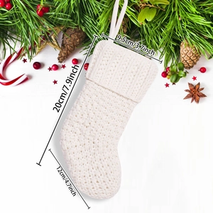 Detailed size view of white knitted Christmas stocking with 20cm length and rustic design